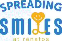 Spreading Smiles at Renatos logo