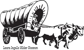 Laura Ingalls Wilder Museum & Tourist Center logo
